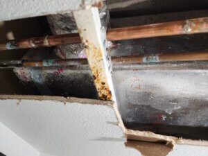 Pinhole Leak in Copper Pipe in Ceiling