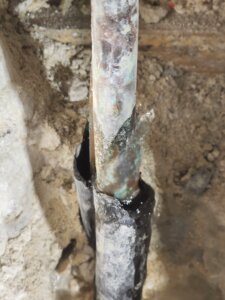 Pinhole Leak in Copper Pipe