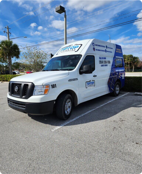 Tip Top Plumbing’s sewer line camera inspection in Broward County, showing a technician’s advanced video camera system inserted into a residential cleanout access, capturing real-time interior footage of underground sewer lines for blockage and damage detection.