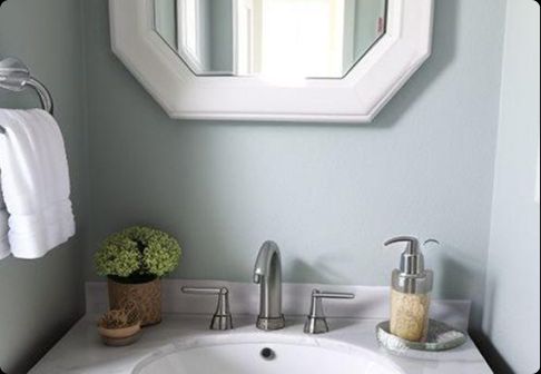 Tip Top Plumbing & Restoration delivers expert bathroom sink and faucet plumbing in Oakland Park FL. This image shows a modern bathroom vanity with brushed nickel fixtures.