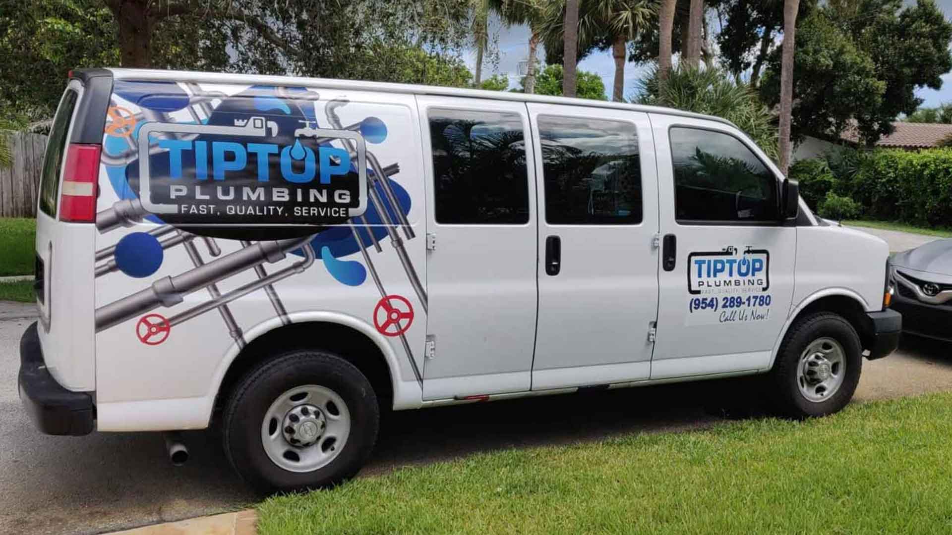Tip Top Plumbing & Restoration service van parked in a Pembroke Pines neighborhood. This reliable local plumbing company serves Broward County with fast, high-quality leak repairs, drain cleaning, and 24/7 emergency service.