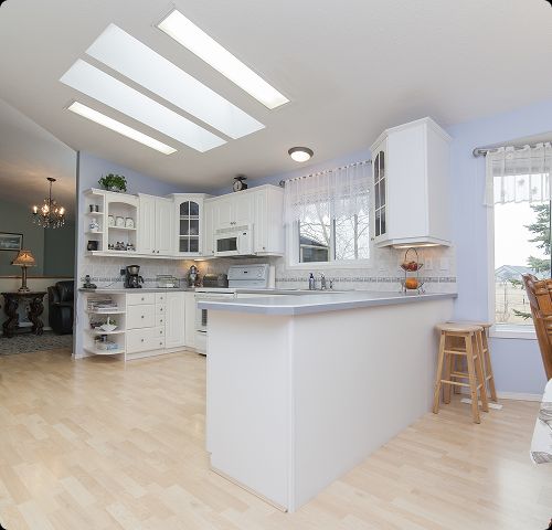 Tip Top Plumbing & Restoration offers expert kitchen plumbing services in Tamarac, FL. Shown is a freshly maintained kitchen featuring reliable faucet installation and plumbing line setup by professional plumbers.