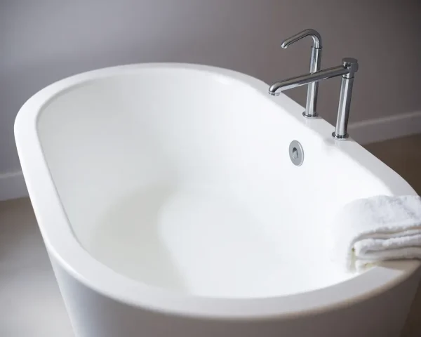 Tip Top Plumbing & Restoration installed a new freestanding bathtub with professional plumbing connections in a modern North Lauderdale bathroom.